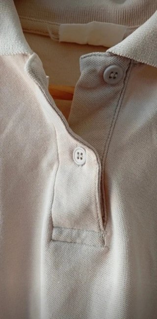 Polo sin mangas beige T. L (40/42)
