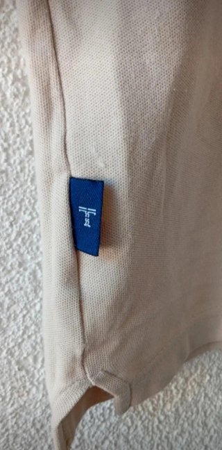 Polo sin mangas beige T. L (40/42)