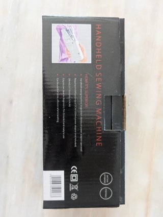 Máquina de coser de mano portátil