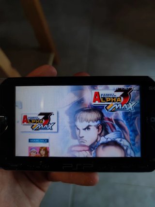 PSP 1004 Mod con Memory Stick 8GB e Caricabatterie