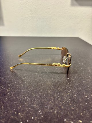 Óculos Panther Rimless Dourado Lente Castanha
