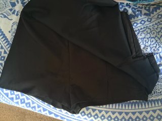 Minifalda Negra tela con raja NUEVA T.L Stradivari