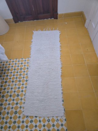 Tappeto di cotone bianco