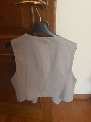 Completo formato da gilet e pantaloni a palazzo