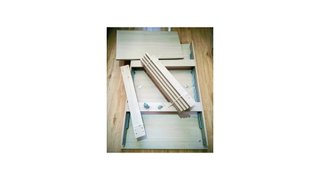Mesa de comedor de madera blanco grisáceo