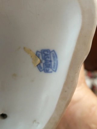 Figura de porcelana caballero