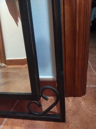 Espejo de forja con detalles