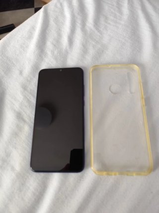 Huawei P Smart+ 2019 con cargador y funda
