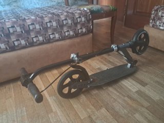 Patinete plegable ruedas negras