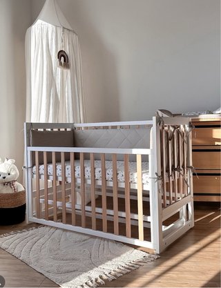 Cuna colecho evolutivo de bebe mecanismo pendulo