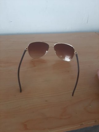 Gafas de sol aviador doradas y marrones
