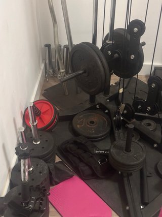 Gimnasio multifunción + 100kg discos