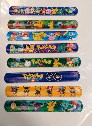 Lote Pokémon: Pulsera, Lápiz y Stickers