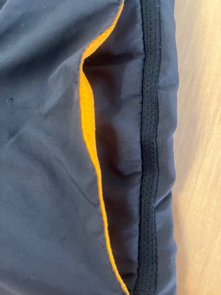 Pantalones cortos running Nike negro/naranja