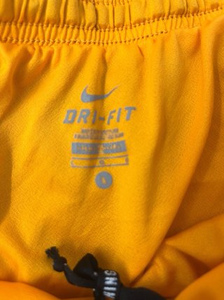 Pantalones cortos running Nike negro/naranja