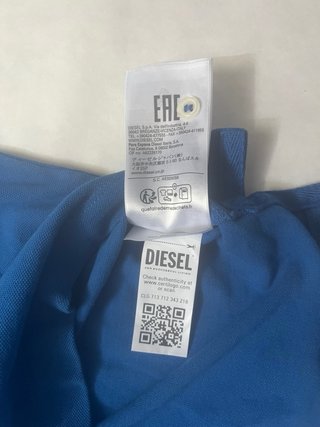 Diesel Polo retro con etiquetas auten. Internas XL