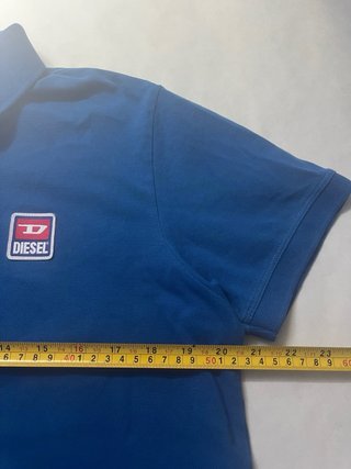 Diesel Polo retro con etiquetas auten. Internas XL