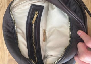 Bolso Uterqüe negro redondo