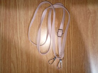 Bolso rosa con correa extraíble