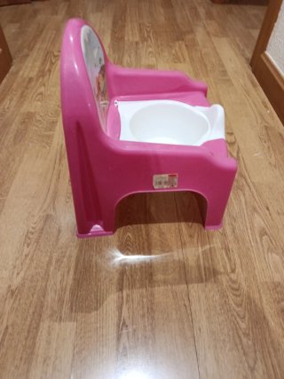 Orinal infantil rosa con dibujos