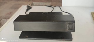 Luz UV detector billetes falsos