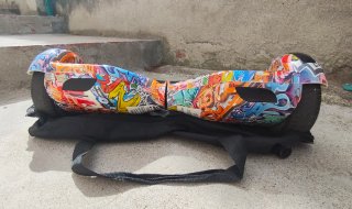 Hoverboard con funda y cargador.
