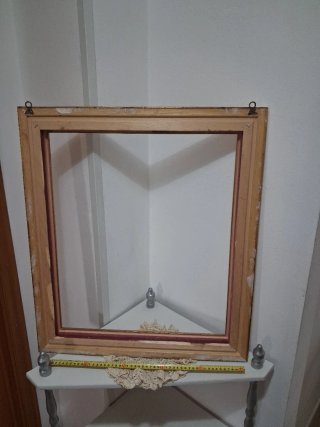 Cornice in legno dorato