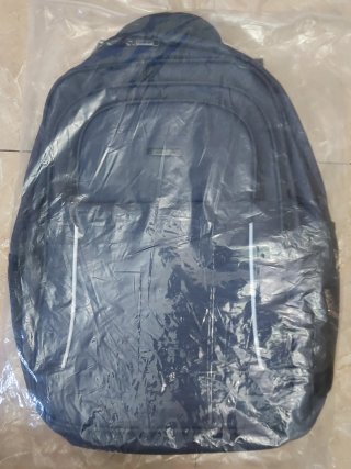 Mochila gris multibolsillos nueva