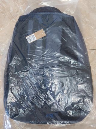 Mochila gris multibolsillos nueva