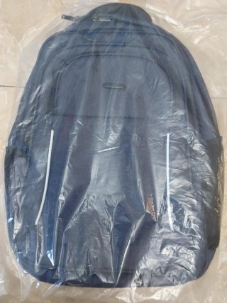 Mochila gris multibolsillos nueva