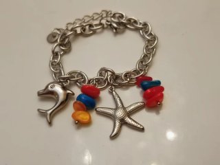 Bracciale con ciondoli delfino e stella marina