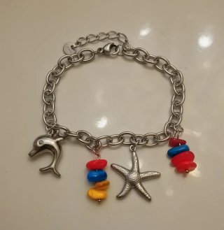 Bracciale con ciondoli delfino e stella marina