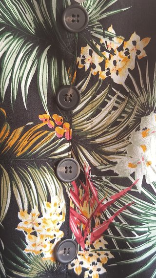 Mono largo negro estampado tropical