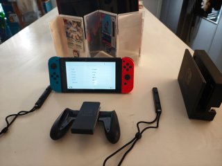 Nintendo Switch + Estuche + 3 Juegos