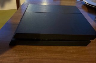 PlayStation 4 PS4 Negra de 1 Tera +mando y cables