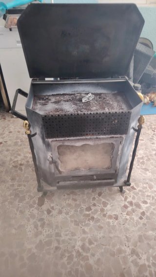 Estufa de leña metal y cristal