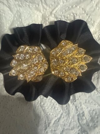Adornos para zapatos/ropa estrella dorada 2 pares