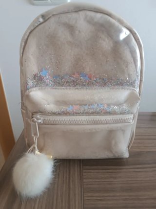 Mochila niña beige con purpurina