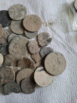 Monedas y botones para limpiar