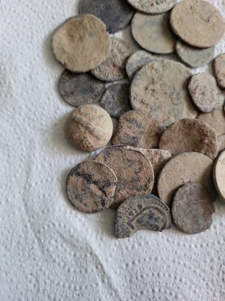 Monedas y botones para limpiar