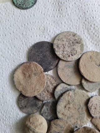 Monedas y botones para limpiar