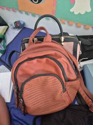 Lote Bolso y Monederos Regalo una maleta