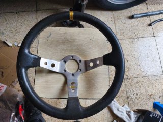 Volante OMP Desplazado