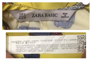 Blusa satinada Zara con estampado de mariposas