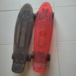 2 Monopatines Penny Board Naranja y Verde