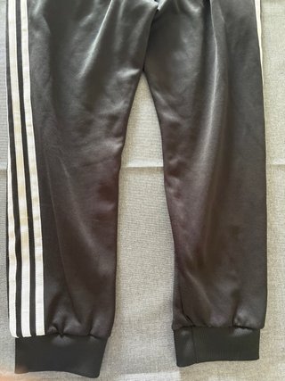 Pantalones Adidas negros con rayas blancas