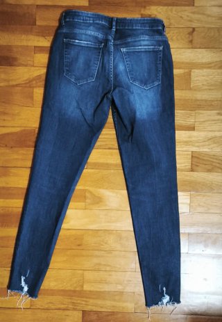 Pantalón vaquero desgastado