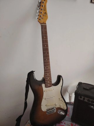 Guitarra Eléctrica y Amplificador