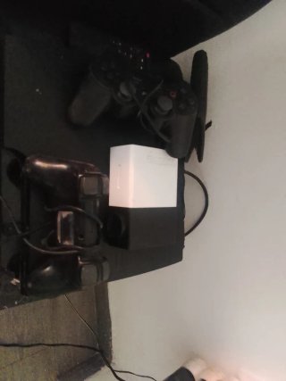 Mandos PS3 y proyector Sony