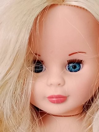 Muñeca rubia platino, copia Nancy clásica